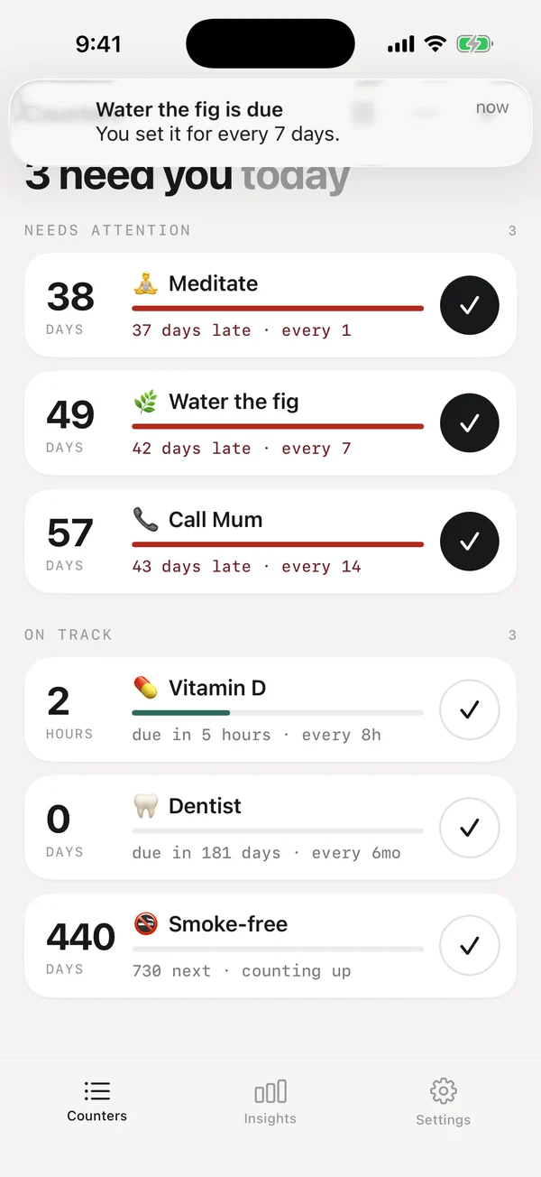 A lock-screen notification: Water the fig is due.